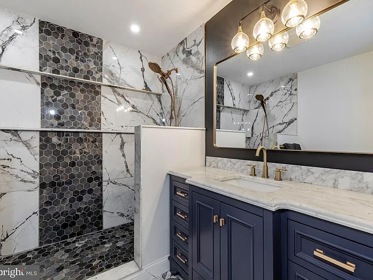 Bathroom with navy vanity