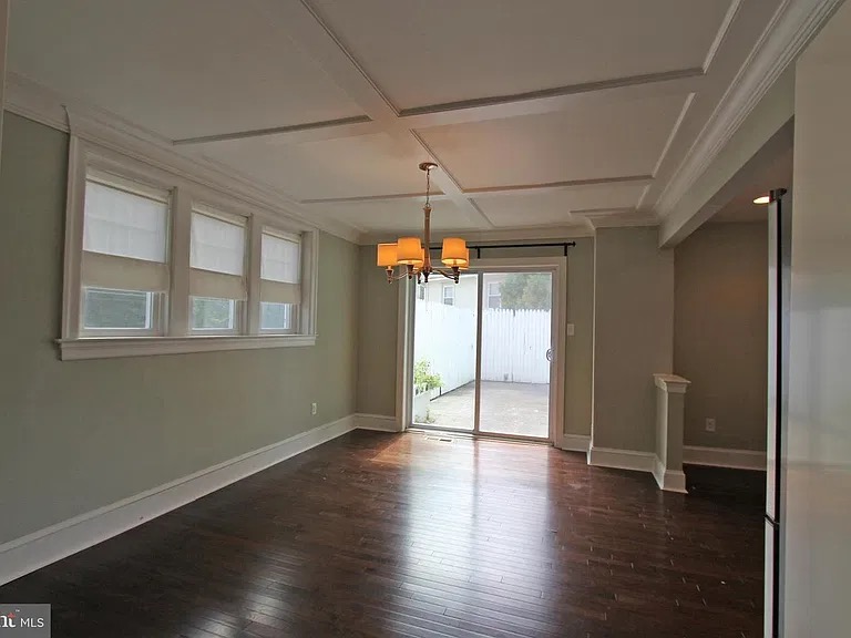 Conestoga House dining area with backyard access